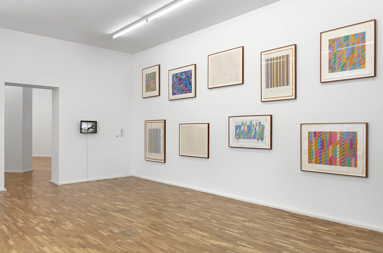 <p>Our Present, Exhibition view, MGKSiegen, Work by Bruce Nauman, Slow Angle Walk, 1968, © VG Bild-Kunst, Bonn 2020, Works by Bridget Riley, Studies, Tracings, 1980-2009, Courtesy the artist, Photo: Philipp Ottendörfer</p>